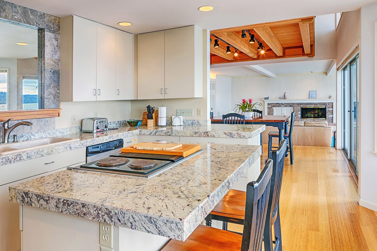Installed stone countertops in a bright modern kitchen