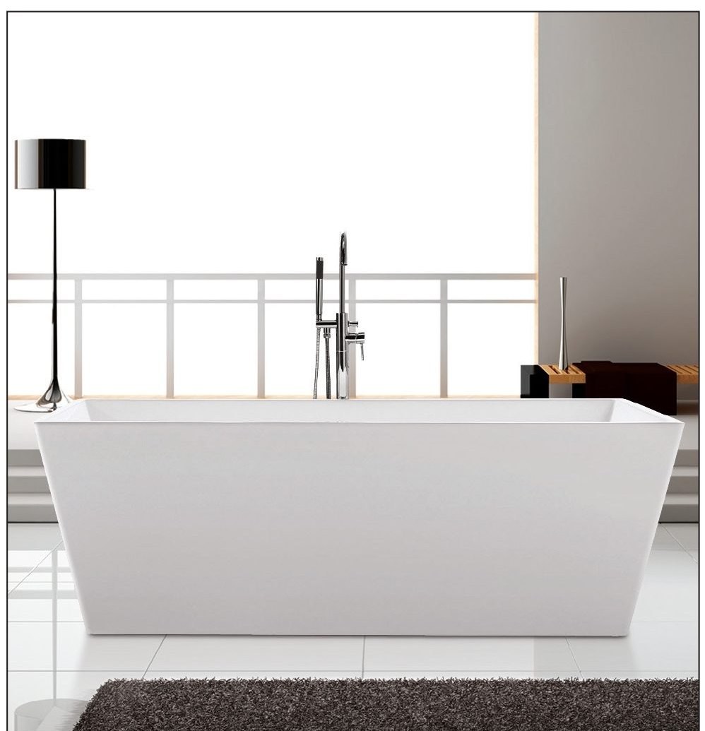 Free-standing acrylic bathtub with floor-mount tub filler in a modern master bath