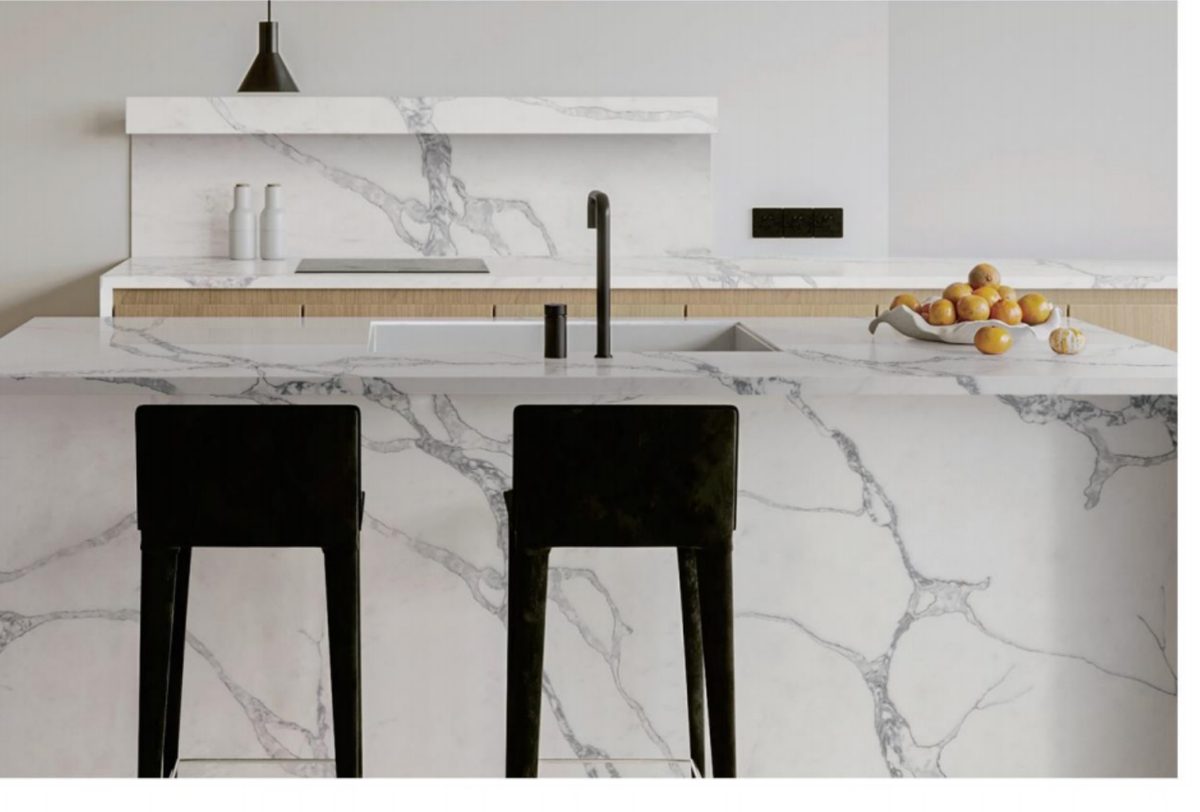 Waterfall breakfast bar with gray veined quartz and matching backsplash — VS510